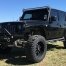 Clays Jeep with 20x10 Matte Black Lonestar Gunslingers