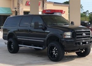Warrens Ford Excursion with 20x10 Lonestar Gunslingers